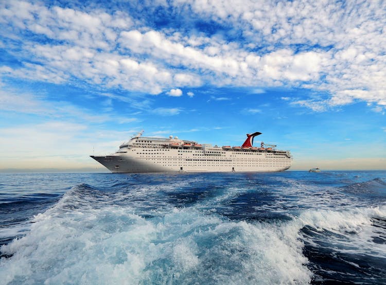 White Cruise Ship Anchored On Sea 