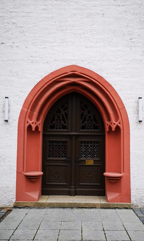 A Wooden Gothic Door With Arch