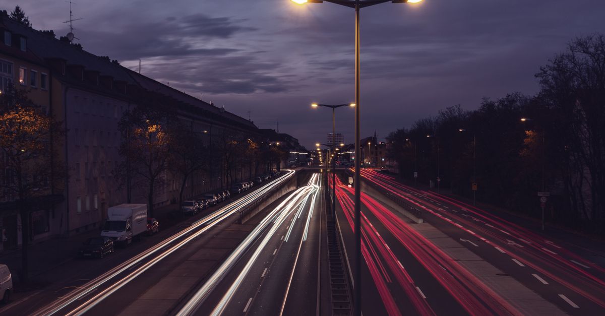 A View of a Highway at Night · Free Stock Photo