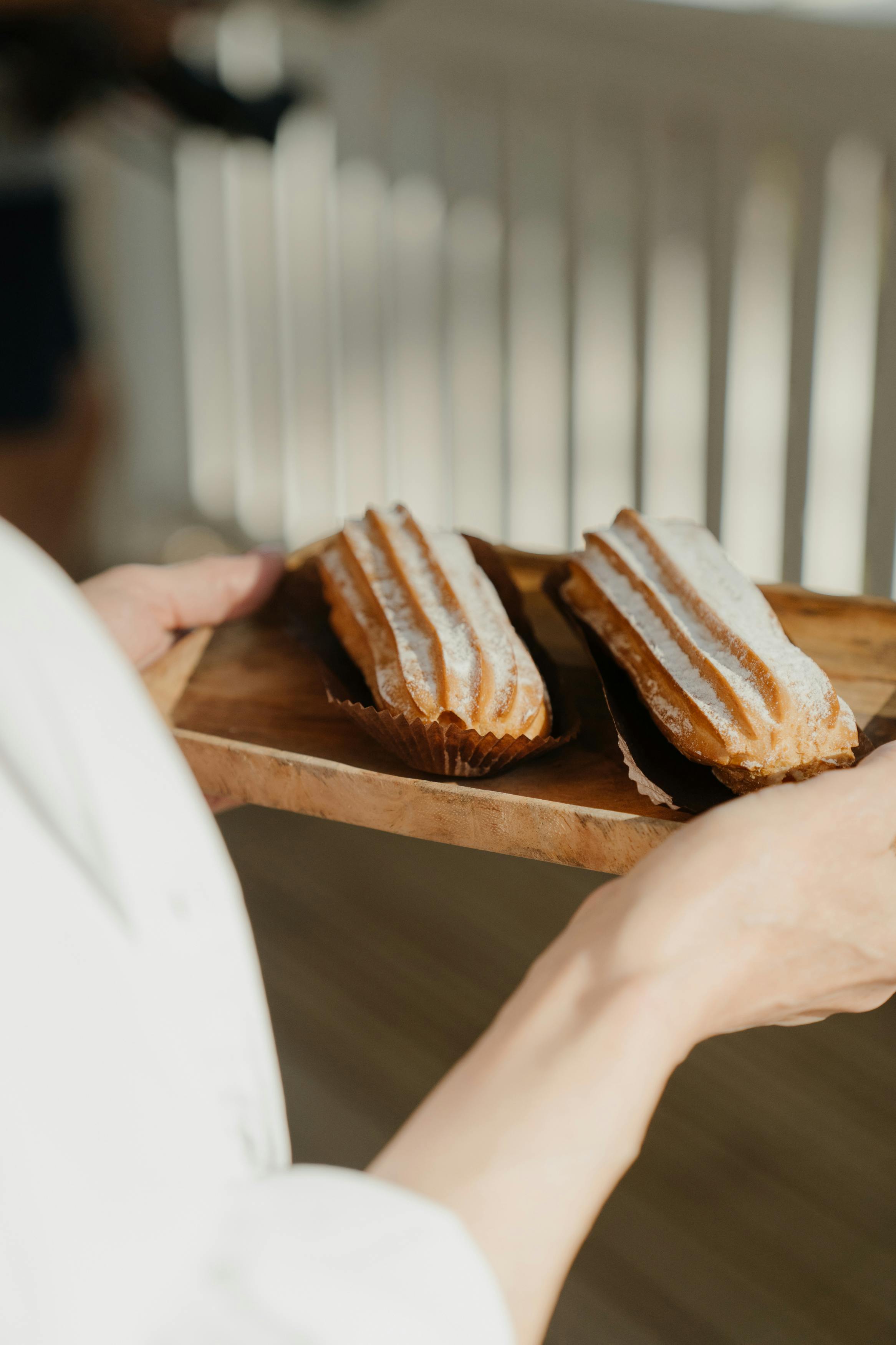 Person Holding A Tray With Pastries · Free Stock Photo