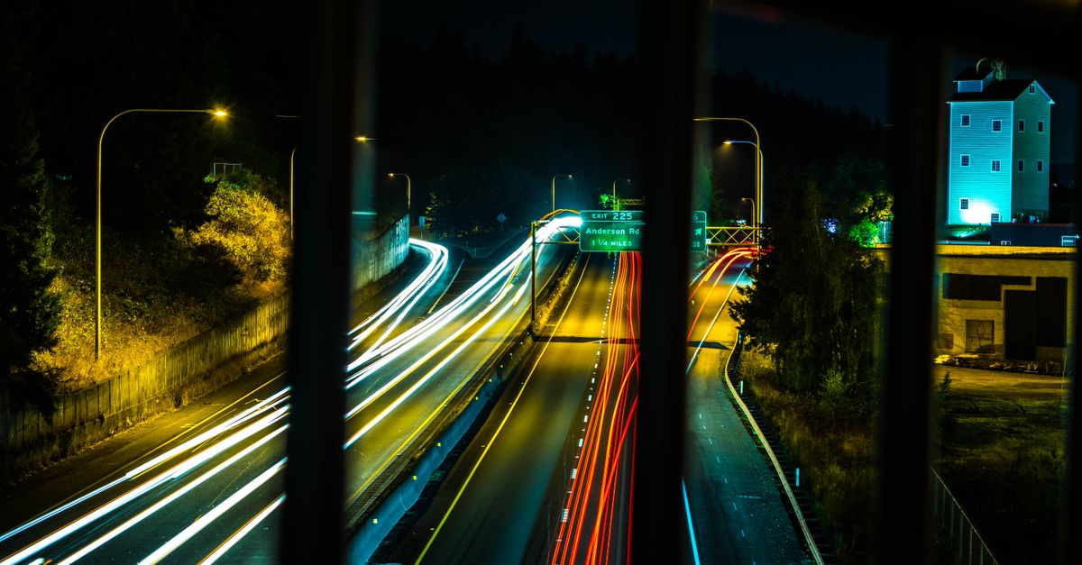 Nighttime long exposure of light trails on a highway in Mount Vernon, WA, USA.