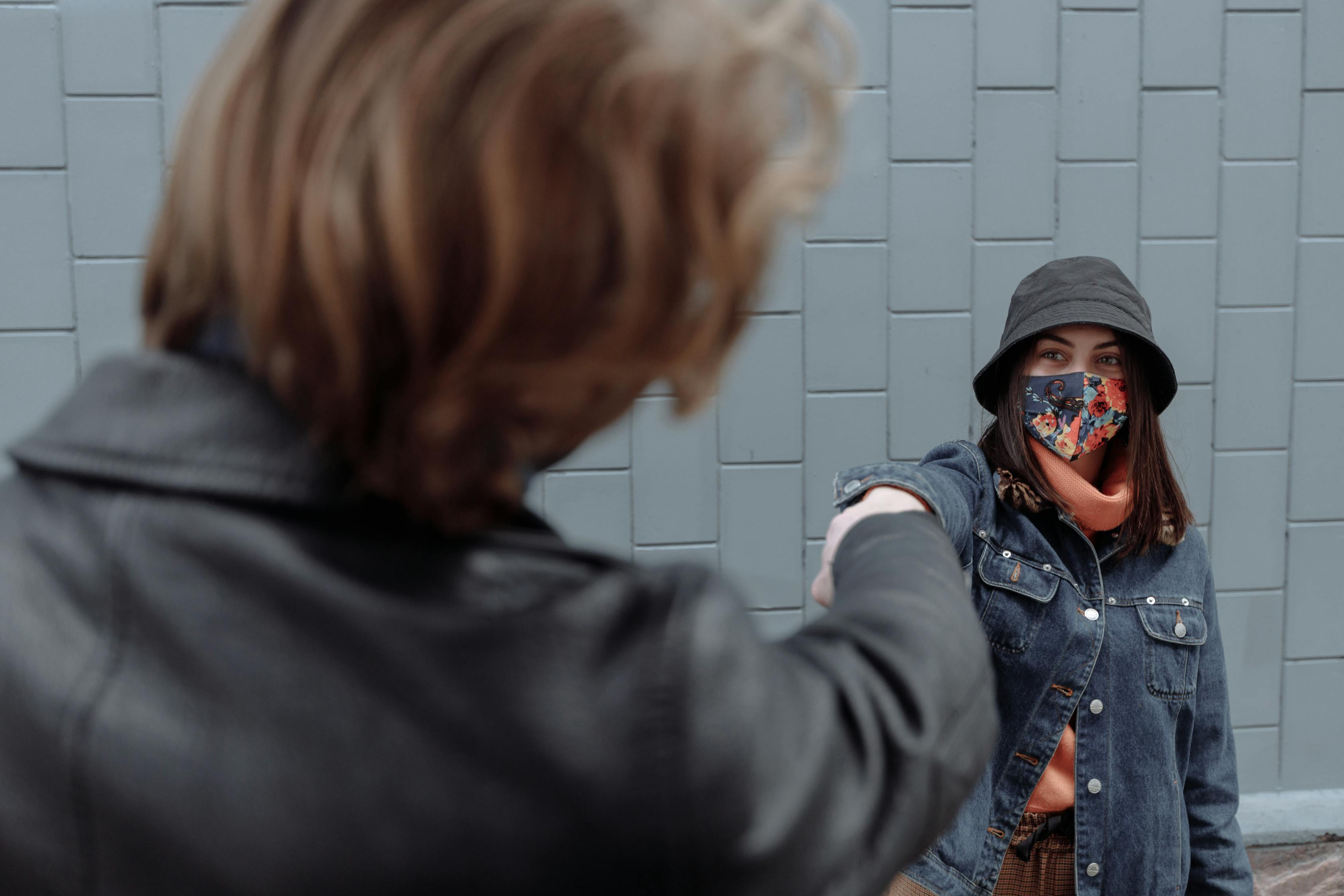 Woman in Black Leather Jacket Wearing Black and Orange Goggles · Free ...