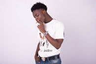 Man in Casual Clothes while Smoking