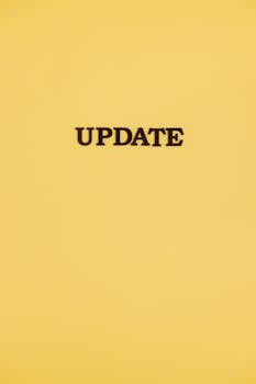 A bold black 'UPDATE' text on a yellow background, ideal for business or tech themes.