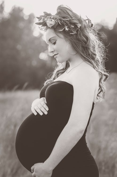 A Grayscale of a Pregnant Woman