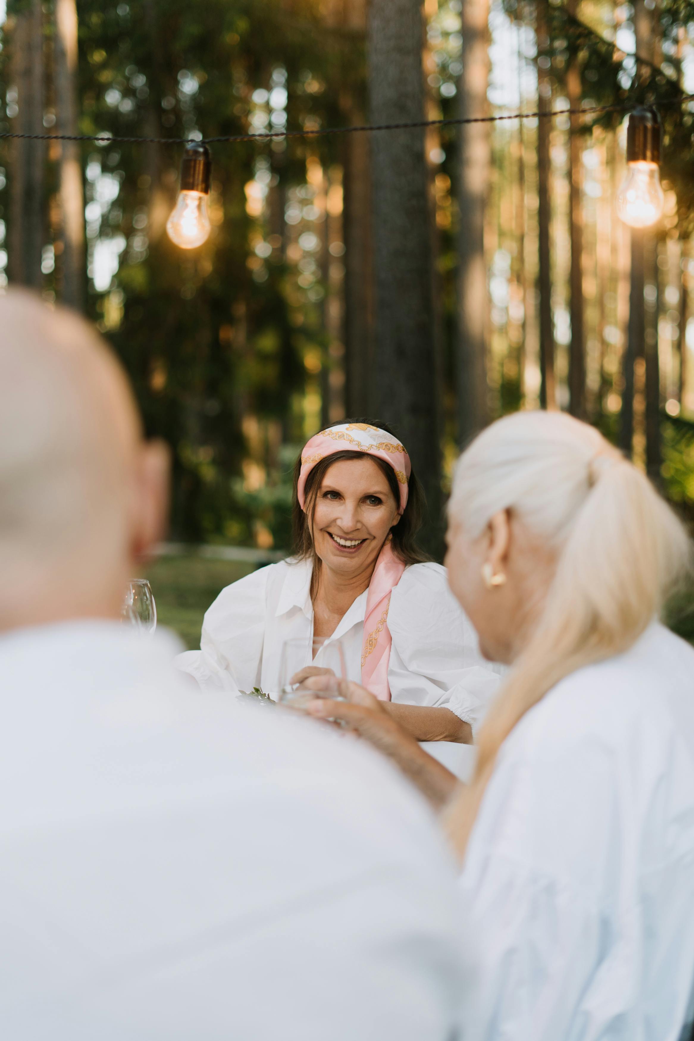 woman in white shirt smiling