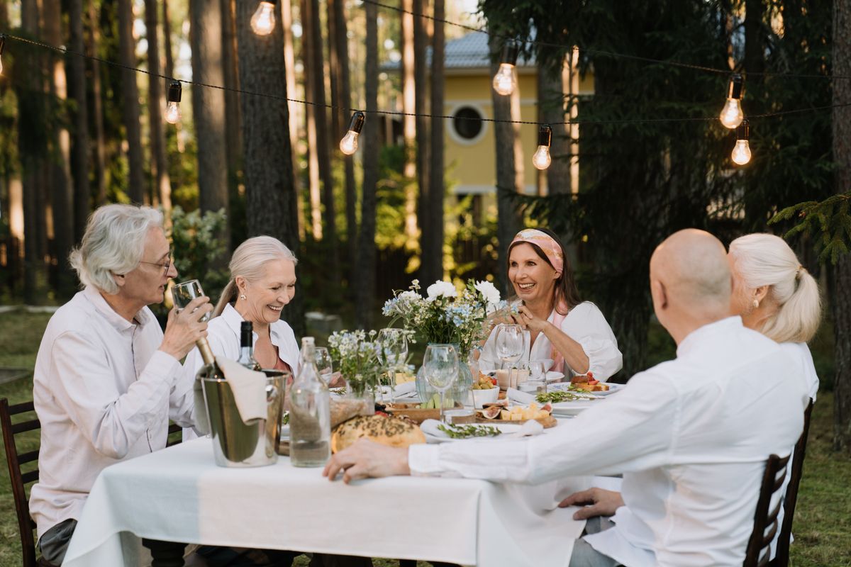 Multi-generational family enjoying dinner together
