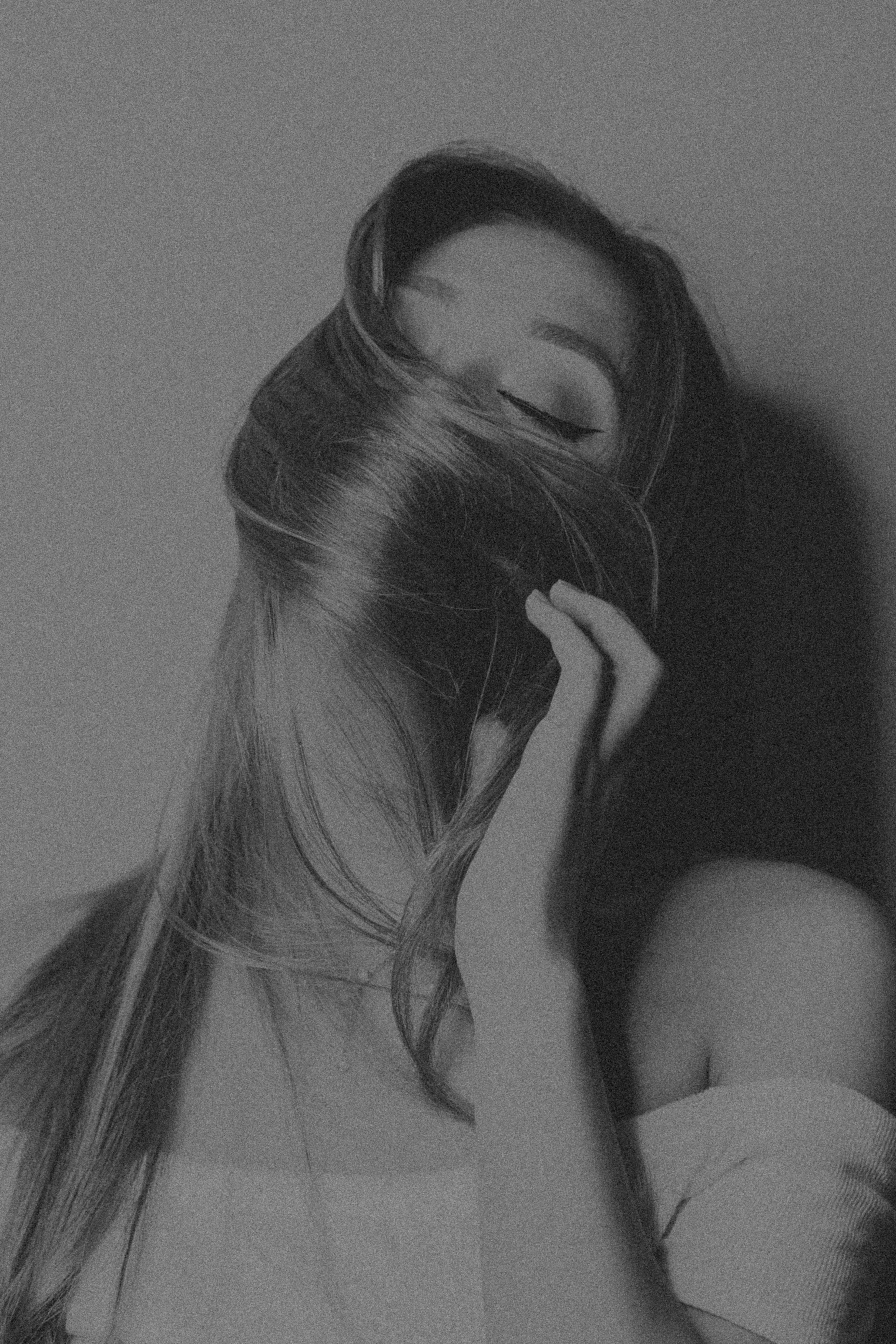 Woman Covering her Face with her Hair · Free Stock Photo