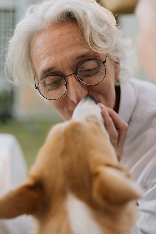 Woman in White Shirt Wearing Black Framed Eyeglasses