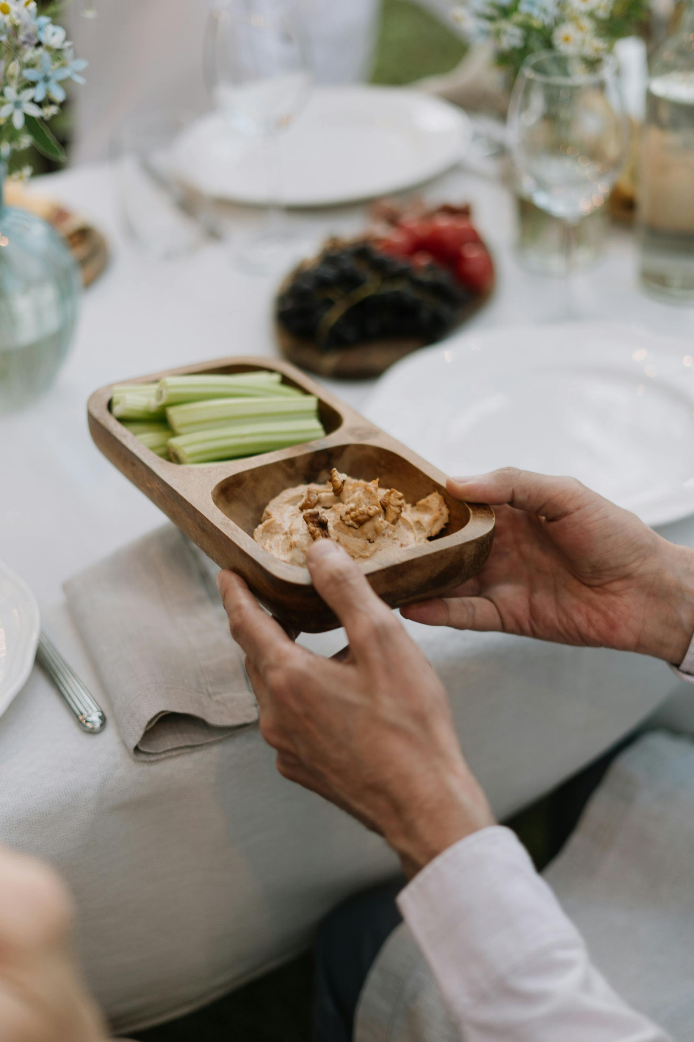 Person Holding Brown Wooden Tray With Food · Free Stock Photo