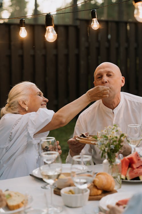 Free A Couple Eating at the Table Stock Photo