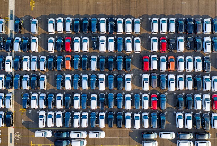 Rows Of Different Cars At Parking Lot