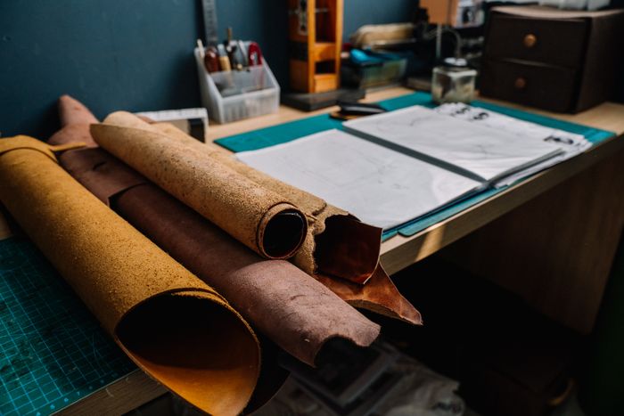 Leather rolls and patterns on the workbench