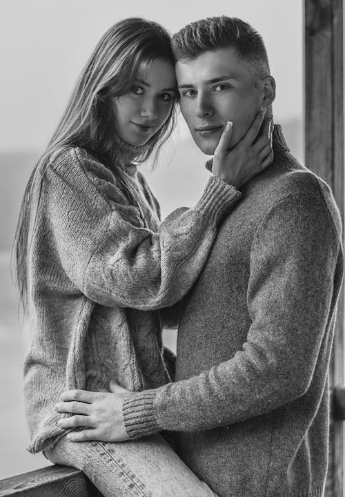 Free Grayscale Photo of Couple Looking at Camera Stock Photo