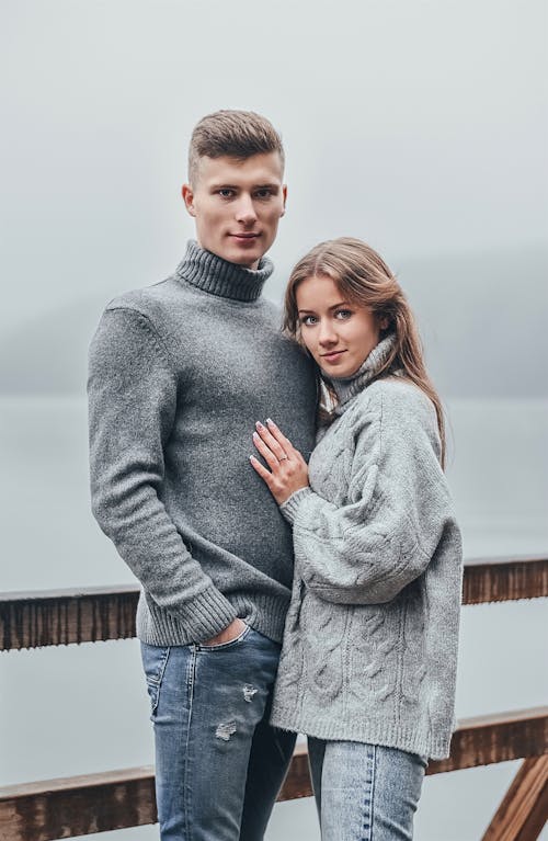 Free Man in Gray Sweater with Woman in Gray Sweater Stock Photo