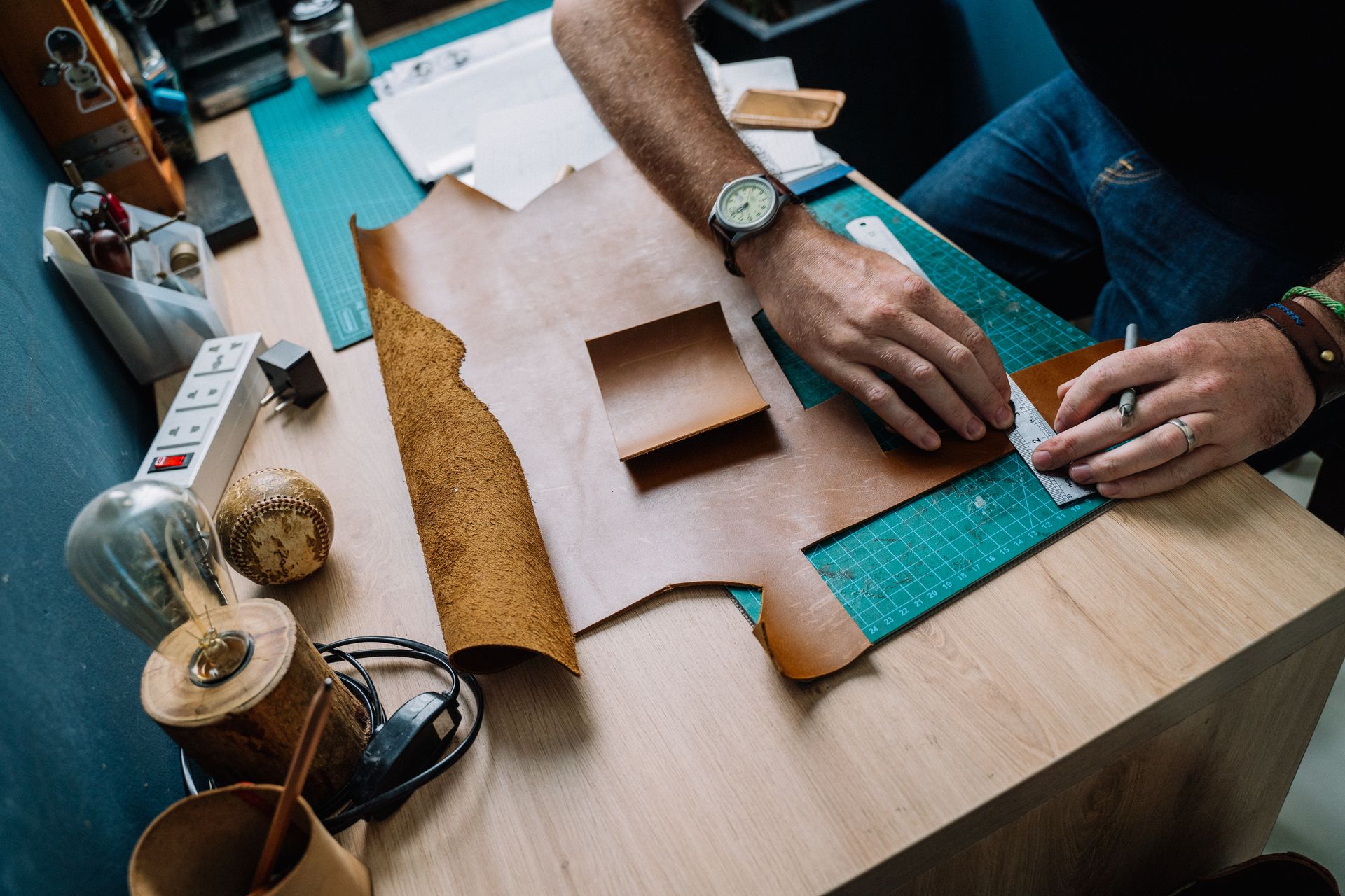 Close-Up Shot of a Person Making Leather