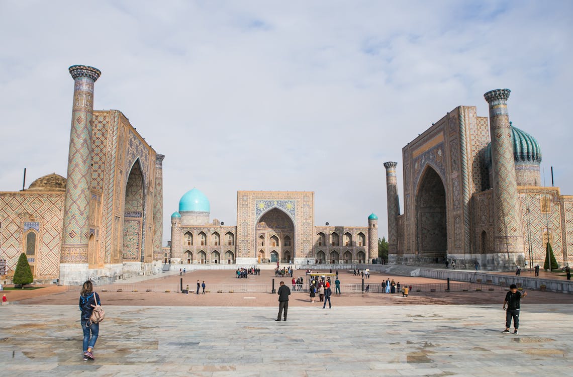 Free People Walking Around the Famous Registan in Samarkand Stock Photo