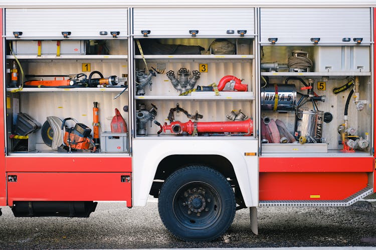 Firefighter Tools And Equipment Inside A Fire Truck