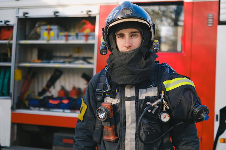 A Firefighter In Uniform 