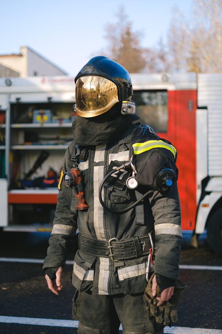 A Firefighter In Uniform Standing