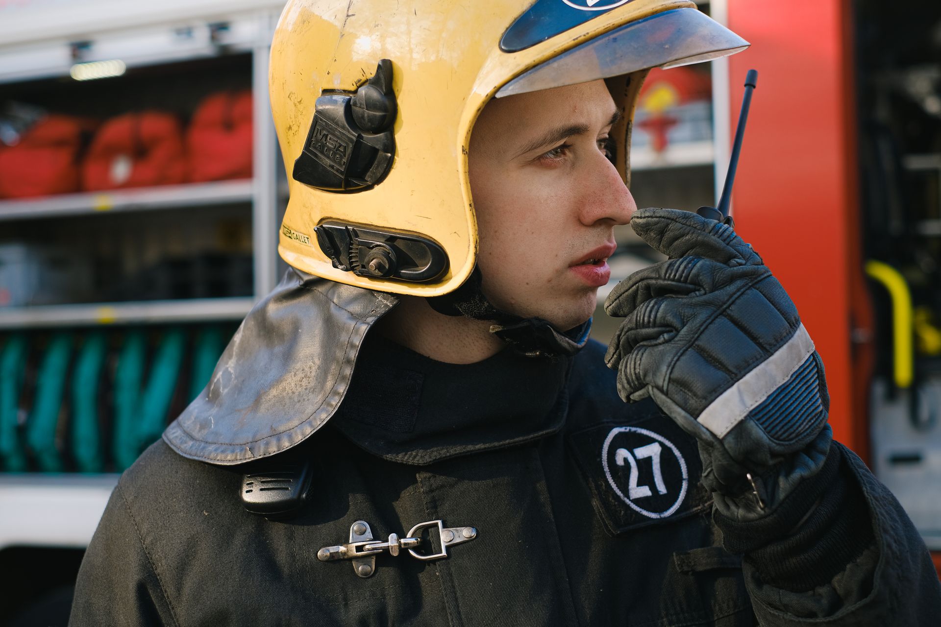 Firefighter Talking on a Transceiver