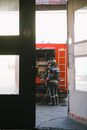 Man Standing Behind a Fire Truck