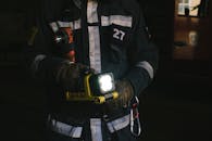 Firefighter Holding a Lantern