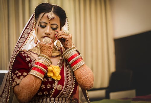 A Woman in Red Saree