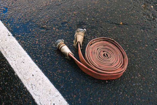 Photo of an Extension Fire Hose on Road