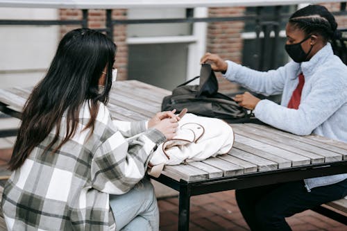 Diverse students with backpacks in campus