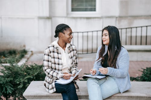 Positive multiethnic students with documents