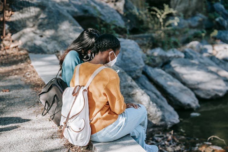 Multiethnic Women In Medical Masks On Asphalt Step In Park