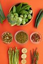 Green Vegetables on Red Table