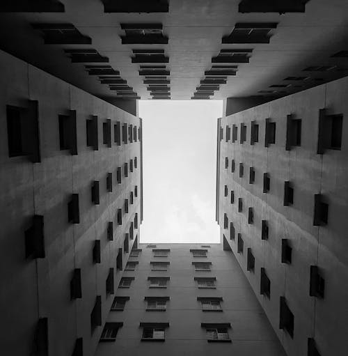 Grayscale Photo of a Concrete Building