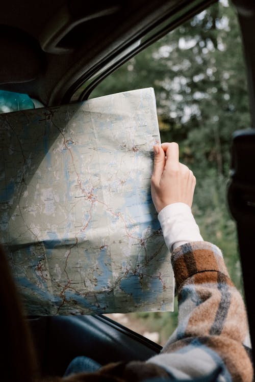 A Person Holding a Map