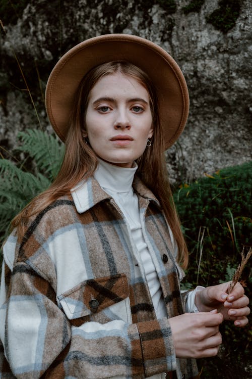 Portrait of a Beautiful Woman Wearing Brown Hat