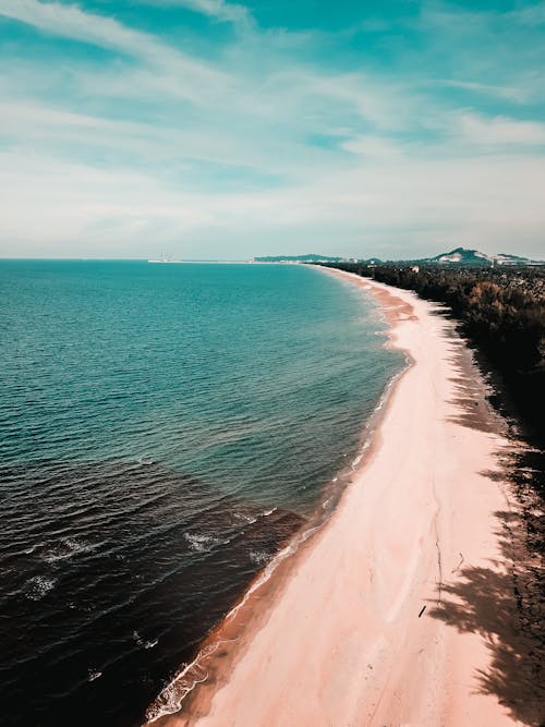 Foto profissional grátis de à beira-mar, aéreo, altura