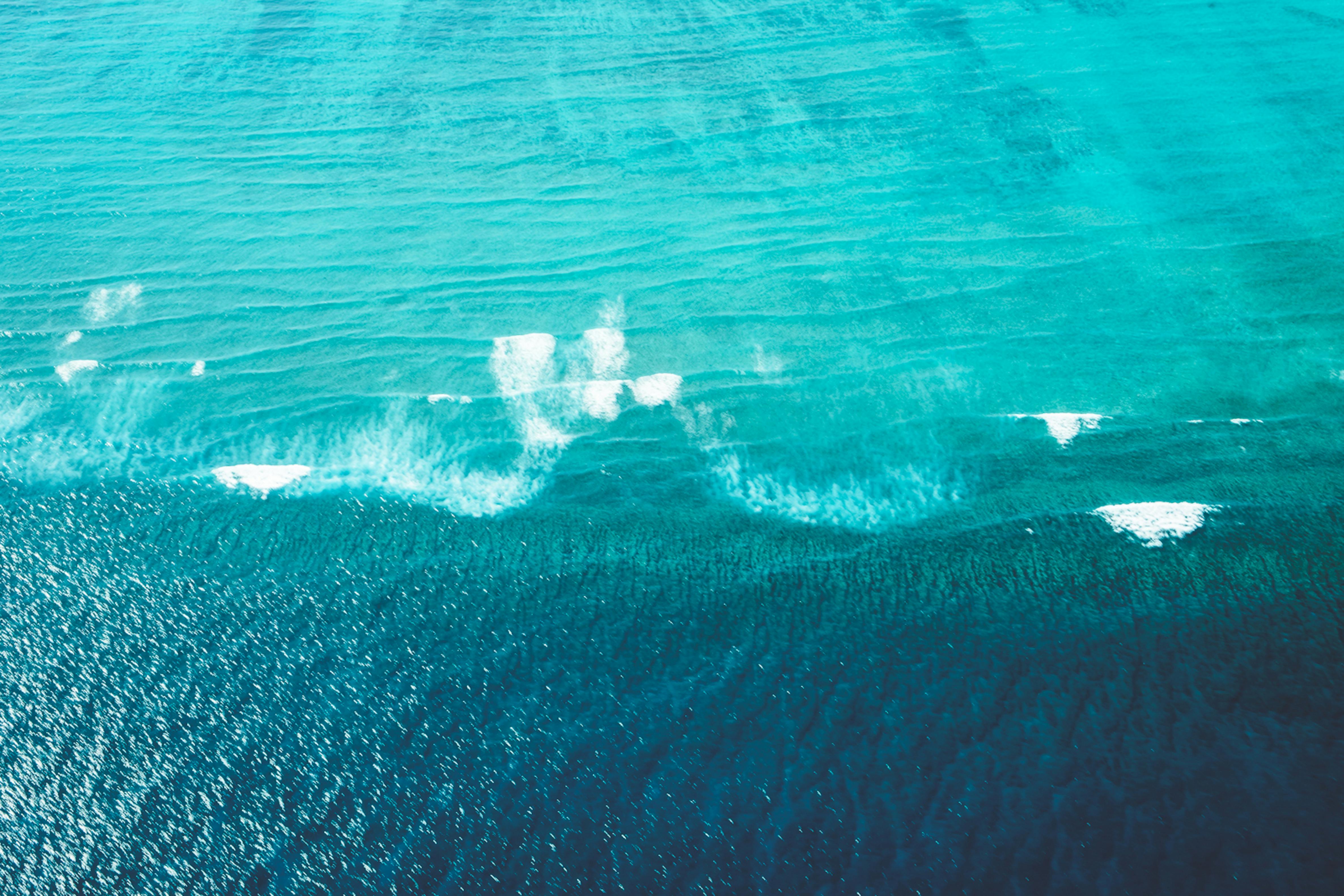 Azure sea with foamy waves