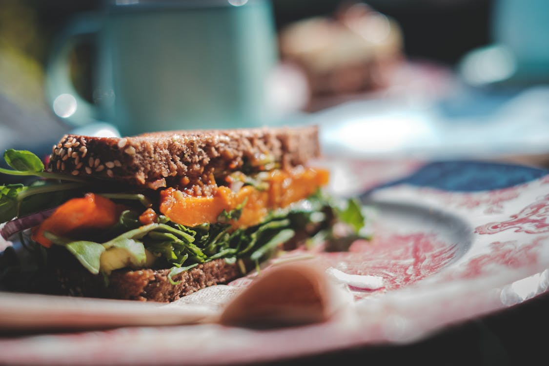 Free Delicious vegetarian sandwich with mixed leaves and tomatoes Stock Photo