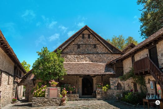 Old Stone Wall Architecture against Blue Sky