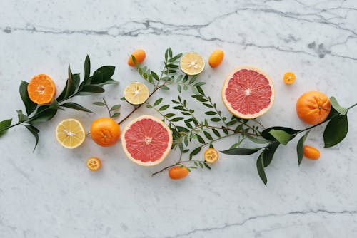 Kostenlos Orange Früchte Auf Weißem Textil Stock-Foto