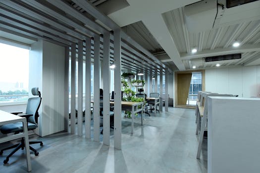 Spacious modern office in Ahmedabad with an open design and indoor plants.