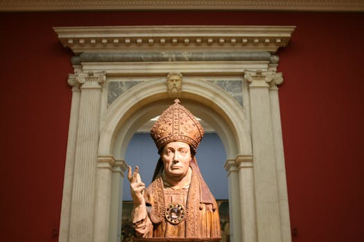 Detailed sculpture of a bishop inside the Bode Museum, Berlin, Germany.