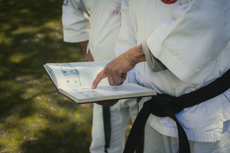 person reading handbook