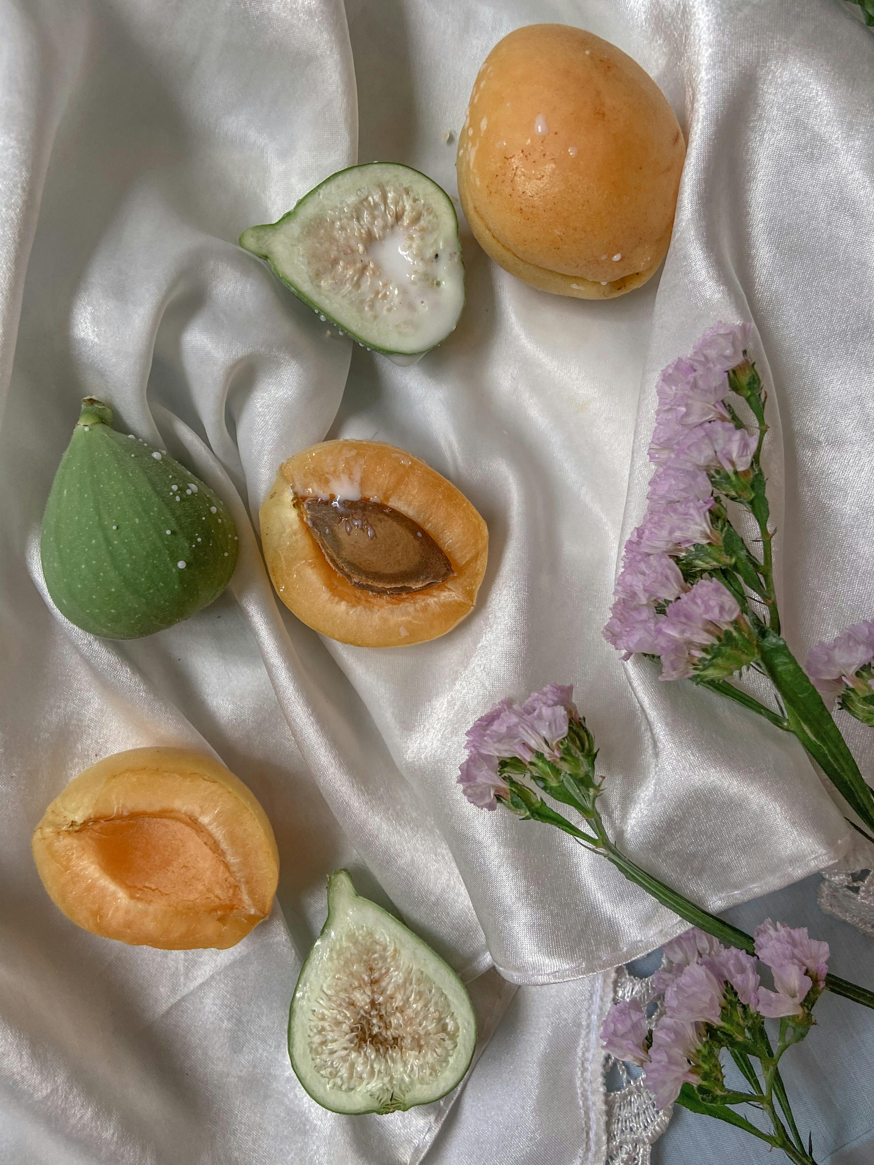 ripe figs and apricots on textile