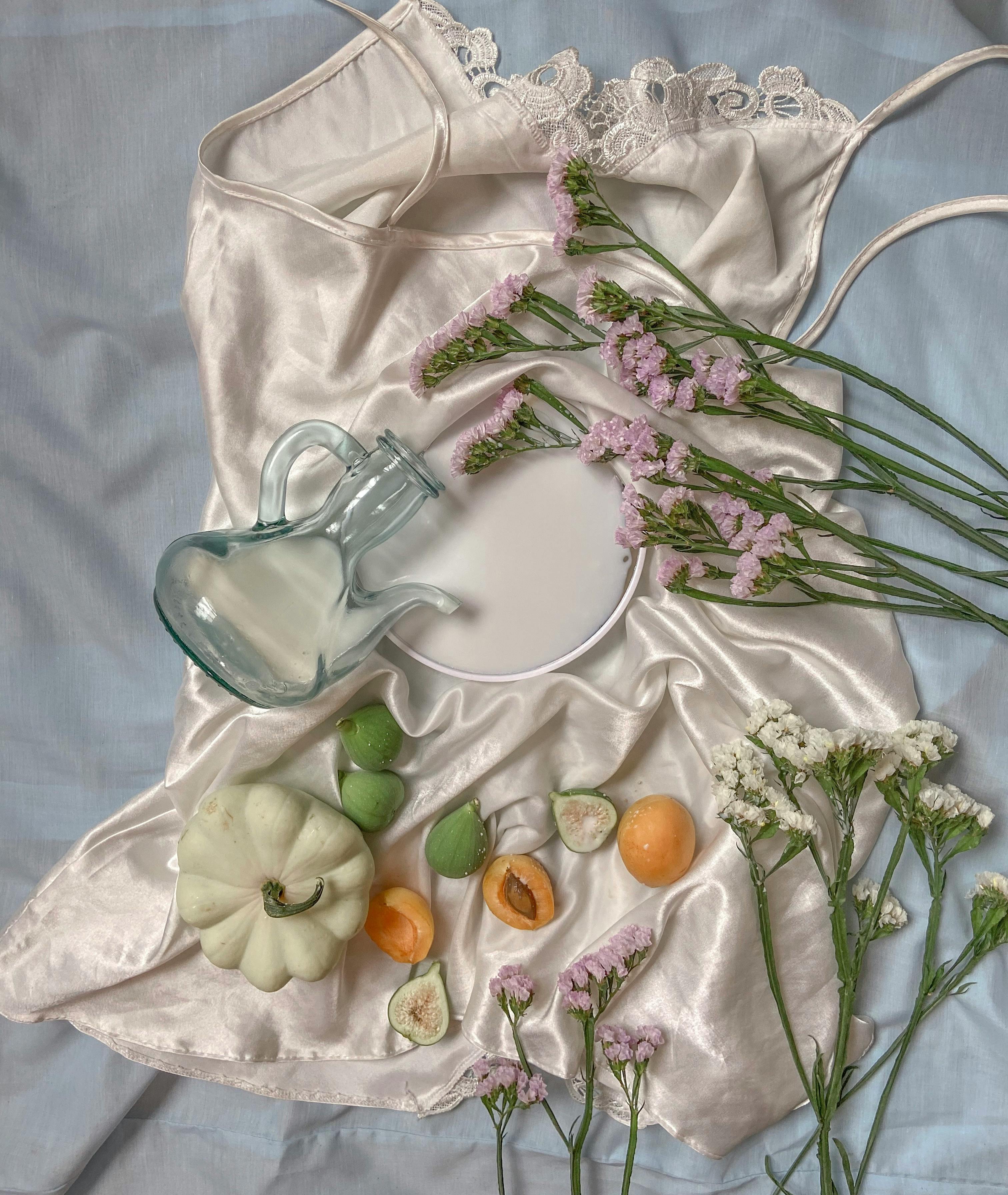 arrangement of fruits and flowers on nightwear
