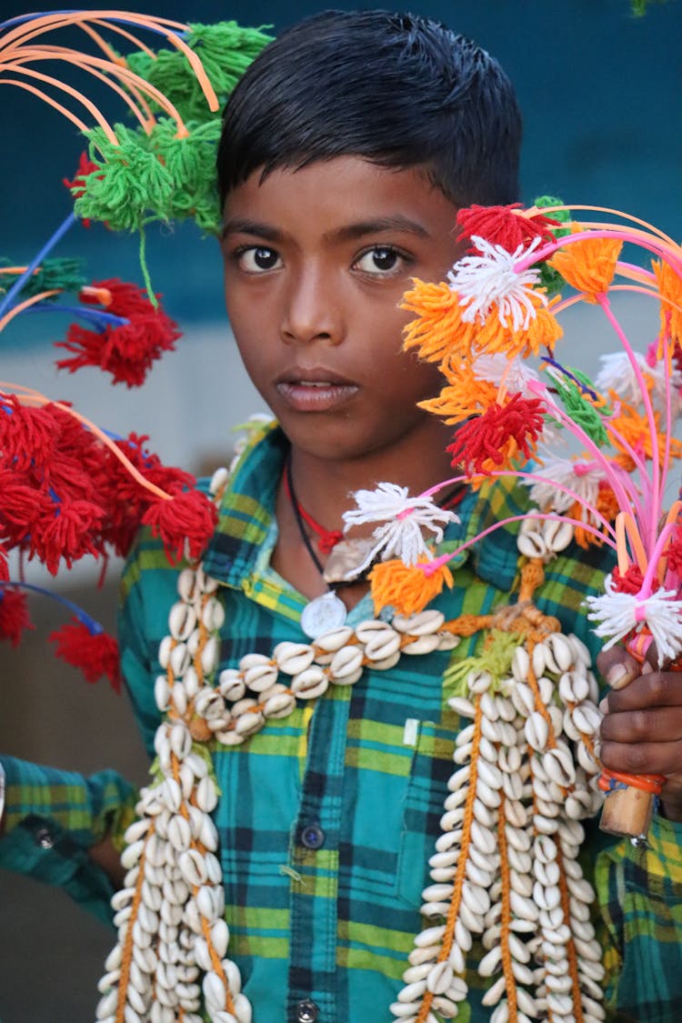 Boy Holding Flowers