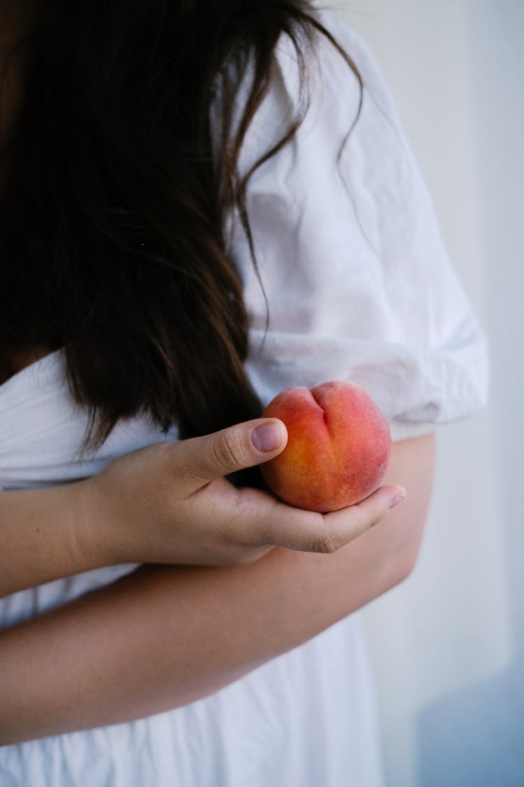 Crop Woman With Ripe Peach