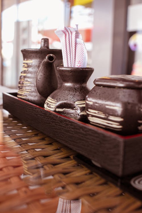 Brown Ceramic Jars on Brown Tray