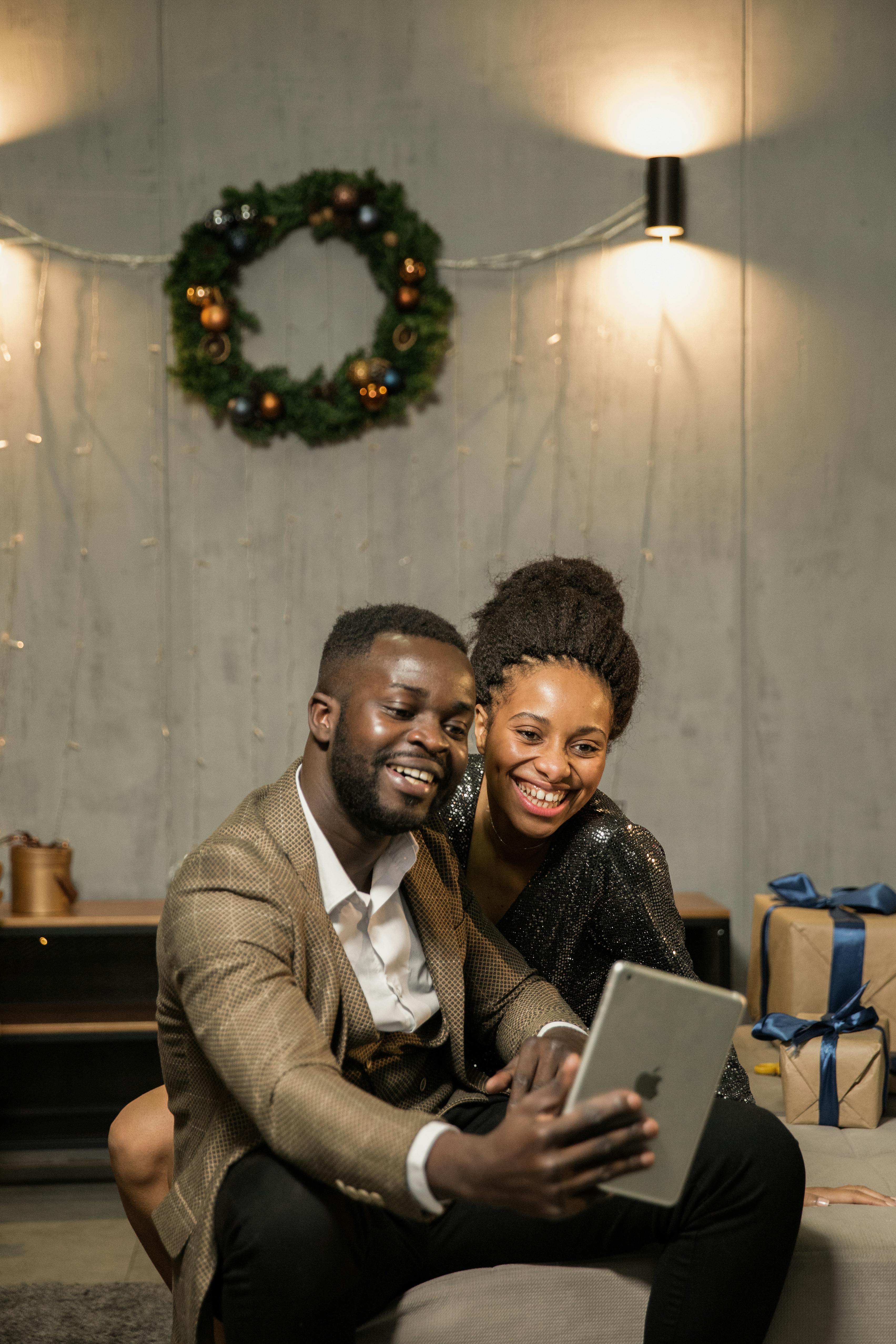 man and woman talking on a video call